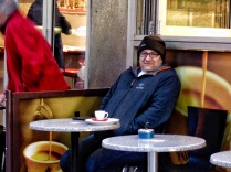 Man outside cafe